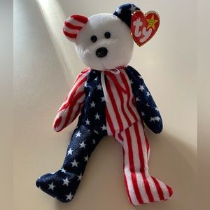 NWT BEANIE BABY - “Spangle” the bear, kept in collectible case